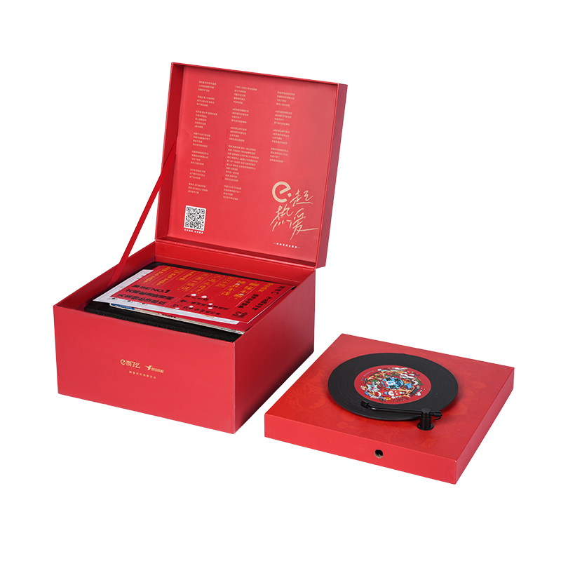 Harde, draaibare muziekdoos in boekvorm met kerstthema