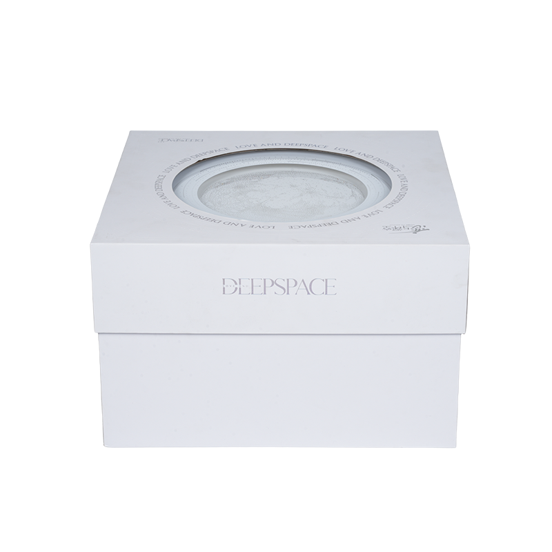 Harde, draaibare muziekdoos in boekvorm met kerstthema